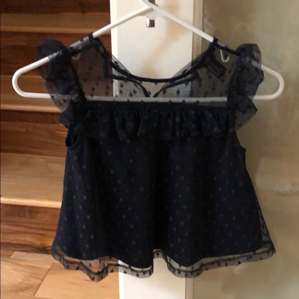 Girls navy polka dot shirt